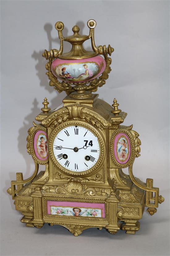 A gilt and ceramic clock H.35cm